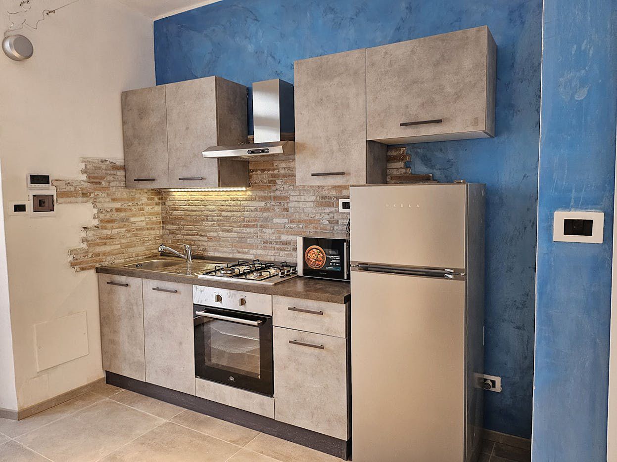 Moderno Monolocale Ristrutturato a Nord di Torino